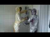 Get 2 Videos with Alina enjoying her Shiny Nylon Rainwear together with a Friend from our 2010 Archive 5