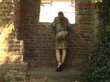 020067 Kathy Pees In The Window Alcove Of a Ruined Building 5