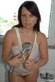 Benita taking a hot shower in a white undershirt and stockings 6