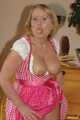 Cute chubby amateurmodel Benita going topless in her Dirndl 10