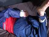 Watch Sonja beeing bound and gagged in shiny nylon Rainwear 5