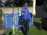 Watch Chloe enjoying the summer in her shiny nylon Rainwear 5