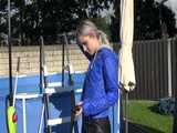 Watch Chloe enjoying the summer in her shiny nylon Rainwear 7