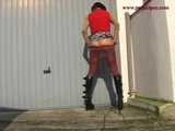 020054 Kathy Slips Away To Pee In Front Of A Garage Door 6