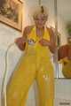 Busty Martina takes a hot bath in her yellow jumpsuit 5