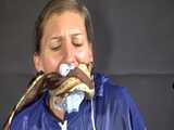 Watch Sandra beeing bound, pantygagged and finally pantyhooded in her shiny nylon Rainwear 5