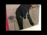 Get 2 Videos of a nice woman from our 2008 Archive enjoying her shiny nylon Rainwear at home 10